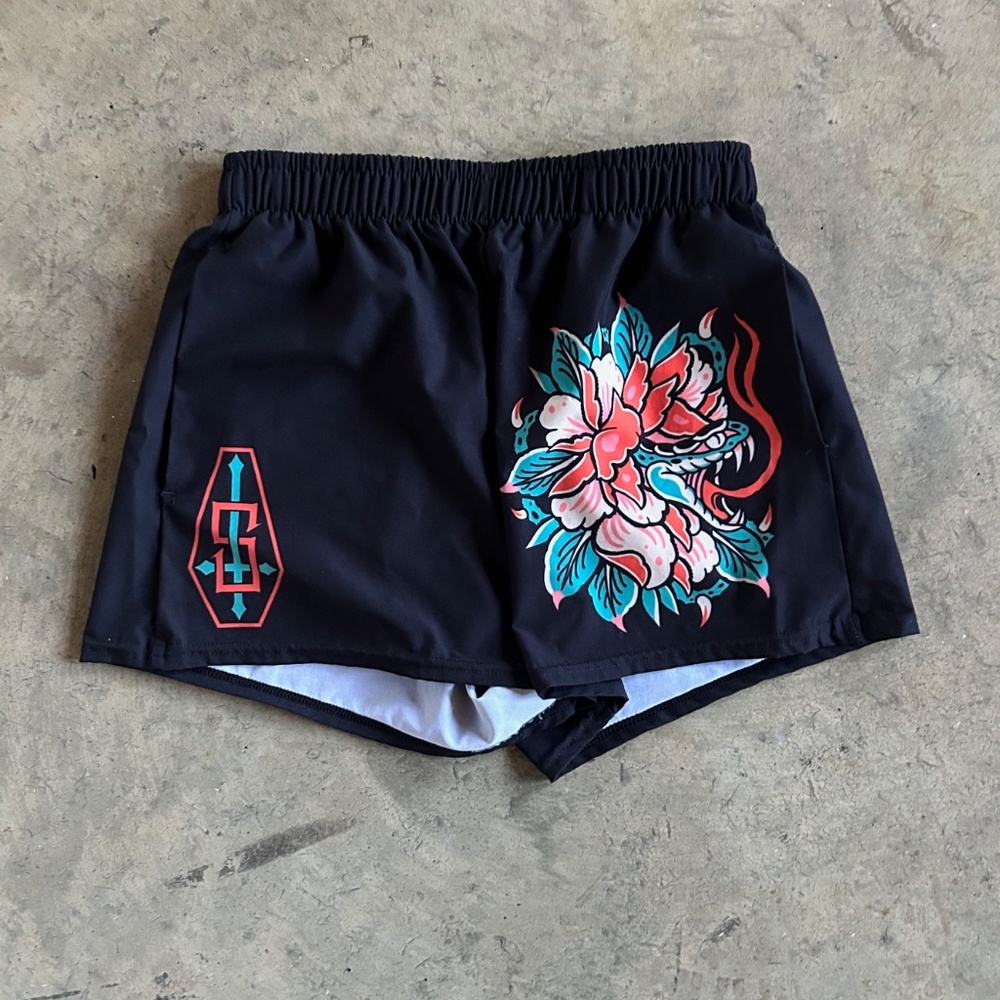 Gym shorts with tattoo graphic